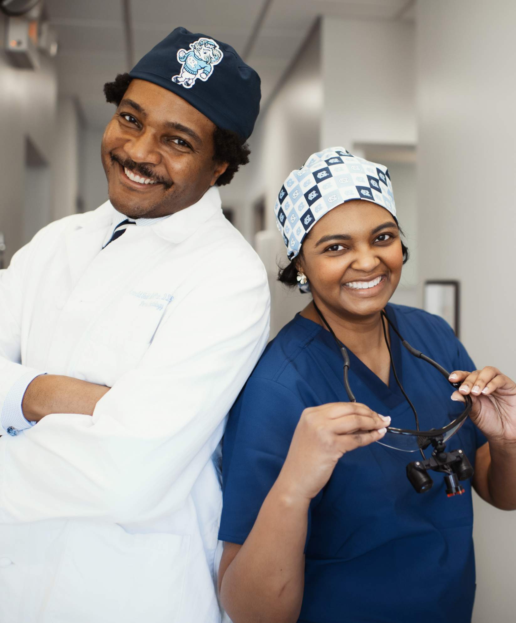 Dr. Shanean Anderson and her husband posing and smiling